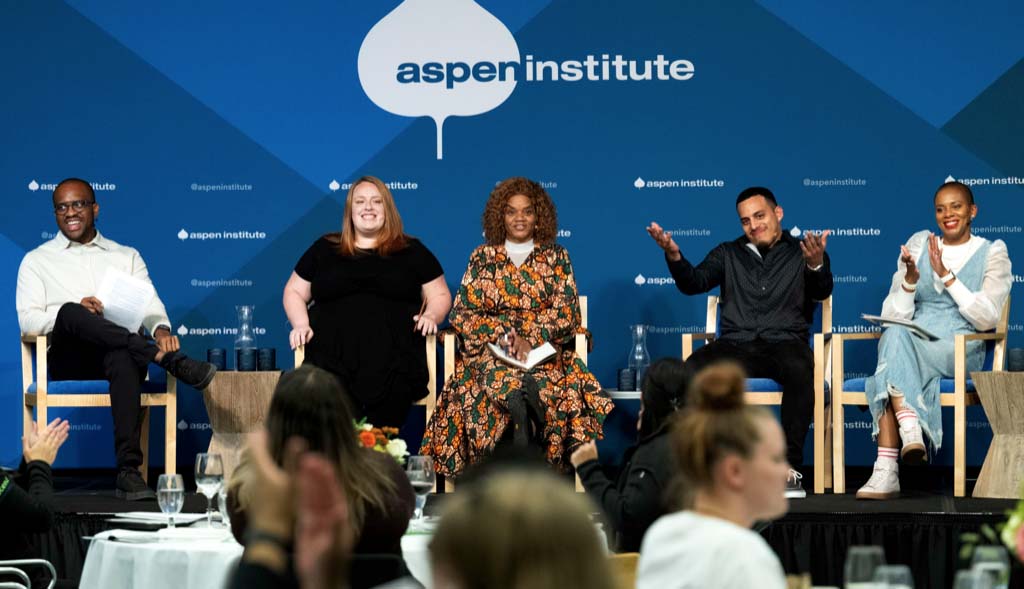 Student parent advisors sitting on a panel at an event hosted by Ascend at the Aspen Institute